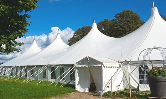 a row of portable restrooms placed outdoors for attendees of a special event in Lindon